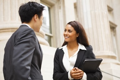 Business-Man-and-Women-talking-at-capital-building